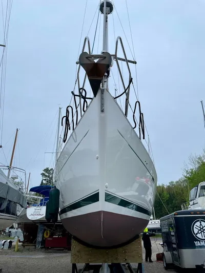 Oasis Yacht Photos Pics 2004 Beneteau Oceanis 393 sailboat on dry dock, front view.