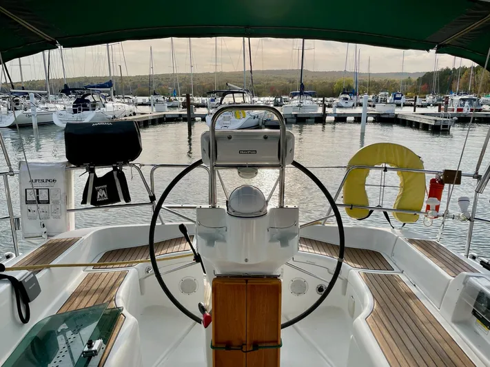 Oasis Yacht Photos Pics Cockpit view of 2004 Beneteau Oceanis 393 sailboat docked at marina.