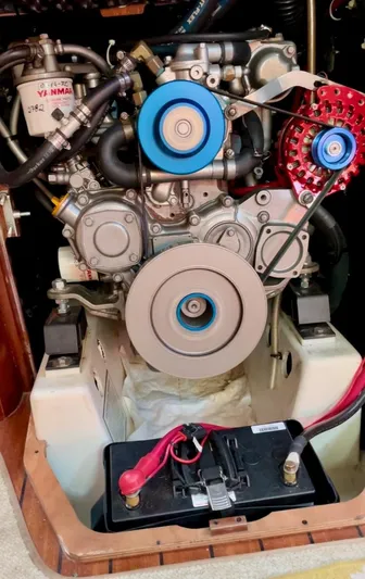 Oasis Yacht Photos Pics Engine of a 2004 Beneteau Oceanis 393 sailboat, showcasing mechanical components.