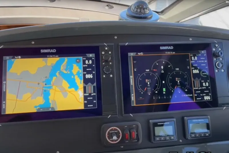 #boatshowspecial Yacht Photos Pics 2023 Bavaria R40 Coupe dashboard with dual Simrad navigation displays.