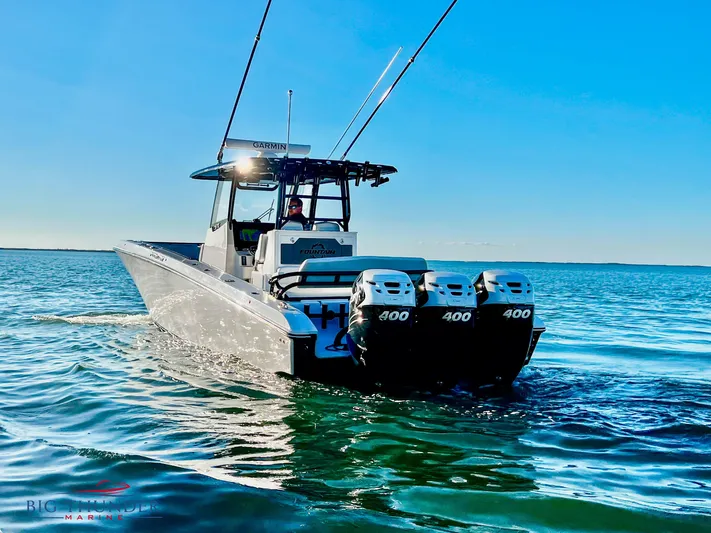  Yacht Photos Pics 2023 Fountain 38 TE boat with triple 400 horsepower engines on the water.