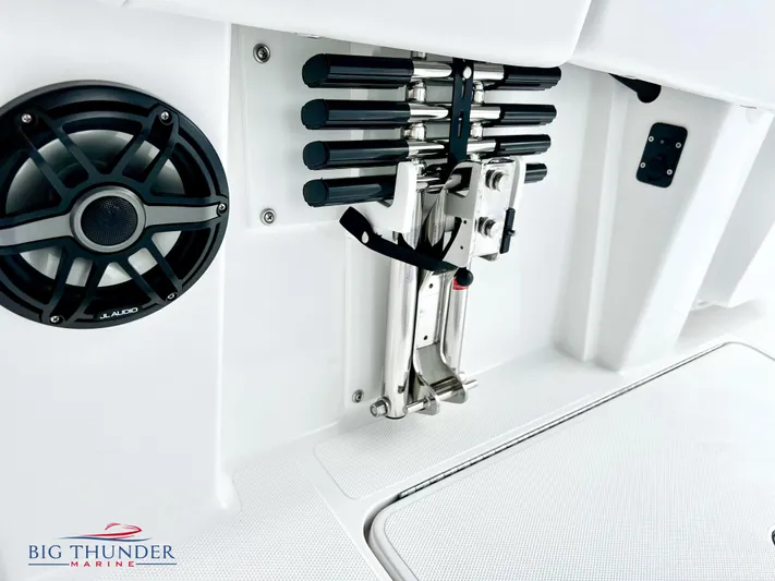  Yacht Photos Pics 2023 Fountain 38 TE boat interior with speaker and rod holders.