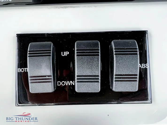  Yacht Photos Pics Close-up of control switches on a 2023 Fountain 38 TE boat.