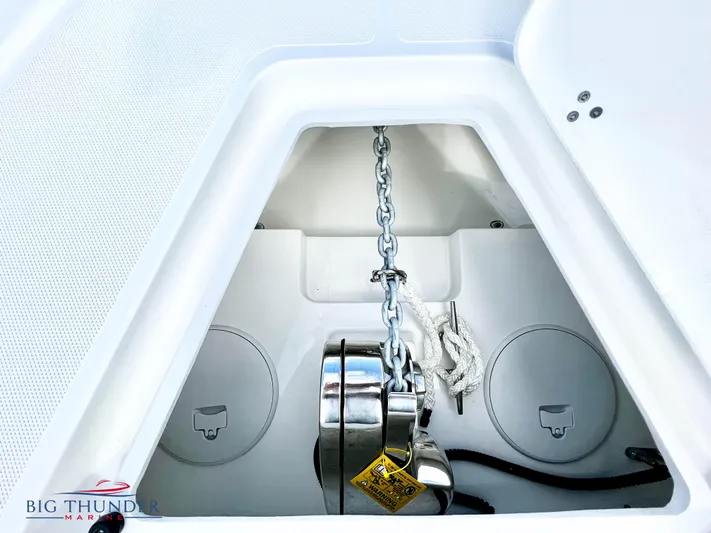  Yacht Photos Pics Anchor locker of a 2023 Fountain 38 TE boat with chain and windlass.