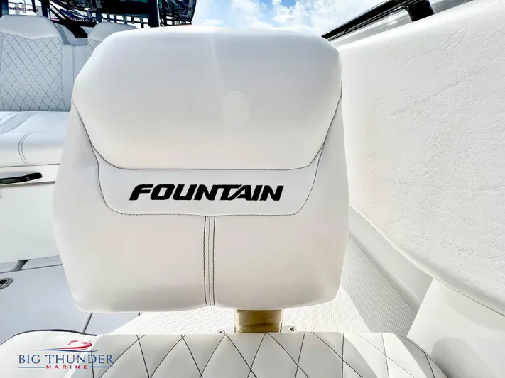  Yacht Photos Pics 2023 Fountain 38 TE boat seat with logo, white upholstery, Big Thunder Marine.
