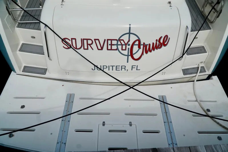 Survey Cruise Yacht Photos Pics 1998 Tiara Yachts 4000 Express boat with "Survey Cruise" name, docked in Jupiter, FL.