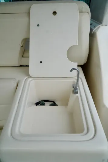 Survey Cruise Yacht Photos Pics 1998 Tiara Yachts 4000 Express boat sink with faucet and cover.