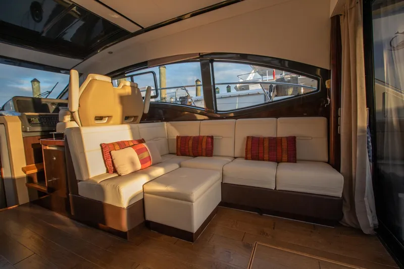 Logan Yacht Photos Pics Luxurious interior of 2018 Sea Ray Sundancer 400 yacht with plush seating and elegant design.