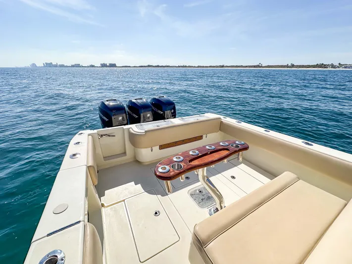 Full Attention Yacht Photos Pics 2012 Contender 39 ST boat with triple engines on open water.