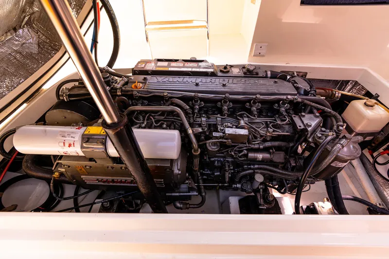 Old Fashioned Yacht Photos Pics Engine compartment of a 2002 Hinckley Picnic Boat EP, showcasing detailed mechanical components.