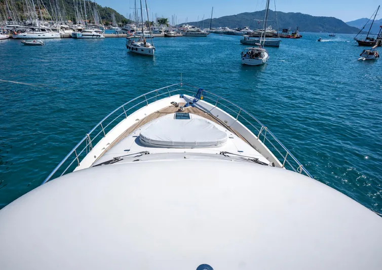  Yacht Photos Pics Bow view of 2010 Fairline Squadron 78 yacht in a scenic marina.