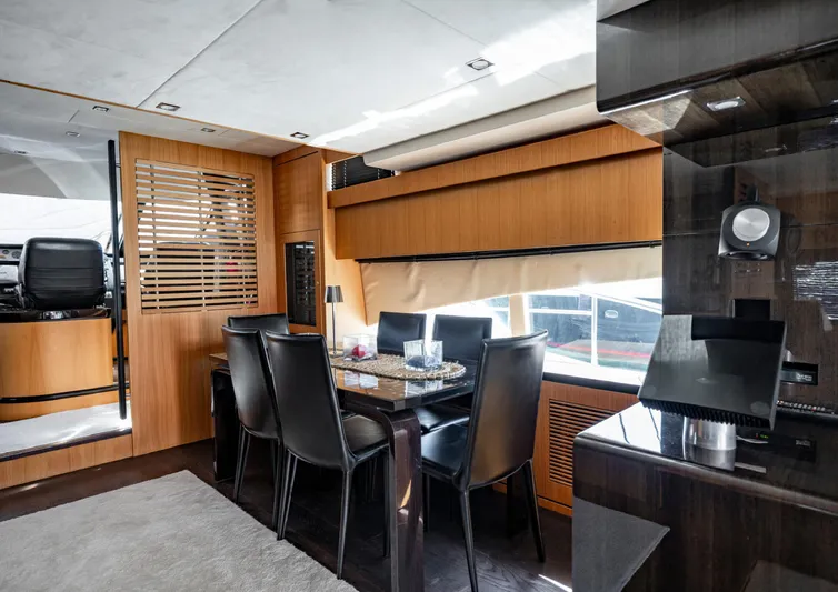  Yacht Photos Pics Luxurious interior of 2010 Fairline Squadron 78 yacht with elegant dining area.
