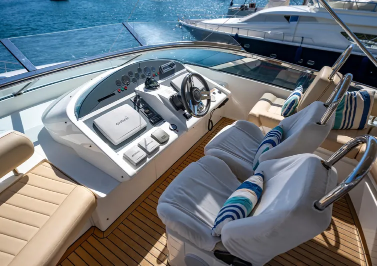  Yacht Photos Pics Luxurious 2010 Fairline Squadron 78 yacht helm with plush seating and ocean view.