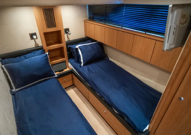  Yacht Photos Pics Twin cabin with blue bedding in 2010 Fairline Squadron 78 yacht.