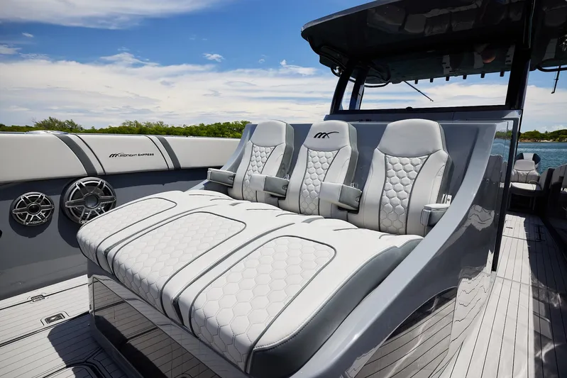  Yacht Photos Pics Luxurious seating on 2025 Midnight Express 43' Open boat, featuring sleek design and premium materials.