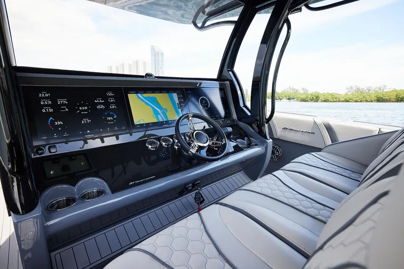  Yacht Photos Pics 2025 Midnight Express 43' Open boat interior with advanced navigation system and luxurious seating.