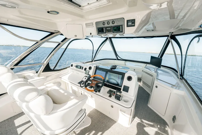 Love & Luck II Yacht Photos Pics Luxurious 2007 Sea Ray 580 Sedan Bridge yacht interior with modern navigation equipment.