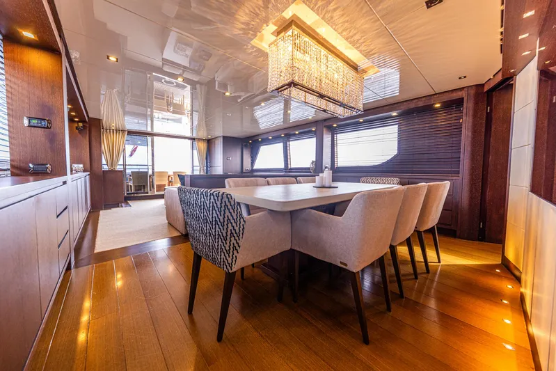  Yacht Photos Pics Luxurious dining area on a 2008 Sanlorenzo SL88 yacht with elegant decor and modern furnishings.