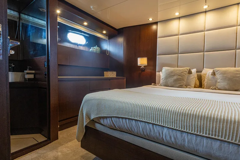  Yacht Photos Pics Luxurious bedroom interior of 2008 Sanlorenzo SL88 yacht with elegant decor and ambient lighting.