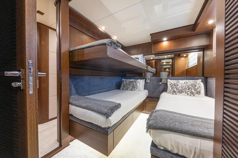 Yacht Photos Pics Luxurious cabin interior of 2008 Sanlorenzo SL88 yacht with twin beds and elegant decor.