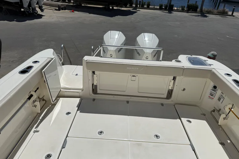  Yacht Photos Pics 2019 Boston Whaler 315 Conquest boat deck with twin Mercury engines.