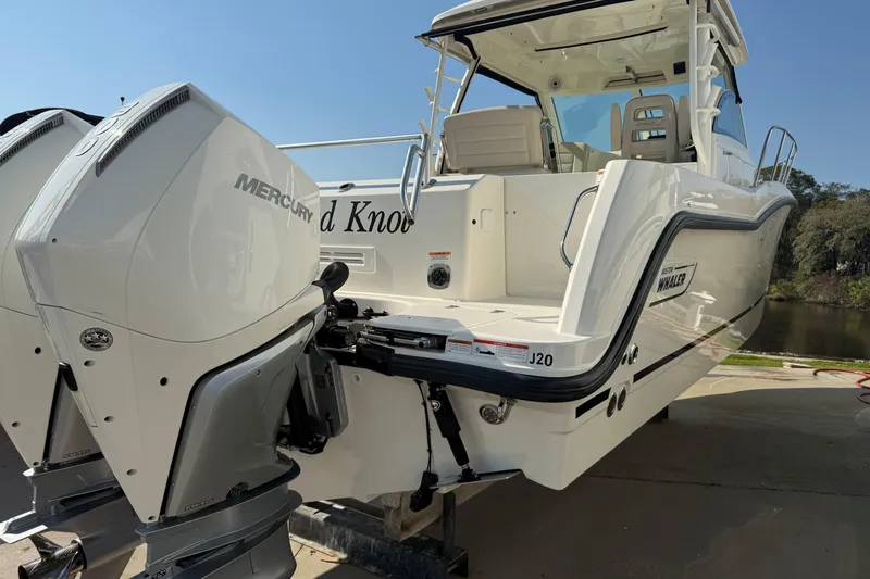  Yacht Photos Pics 2019 Boston Whaler 315 Conquest boat with dual Mercury outboard engines.