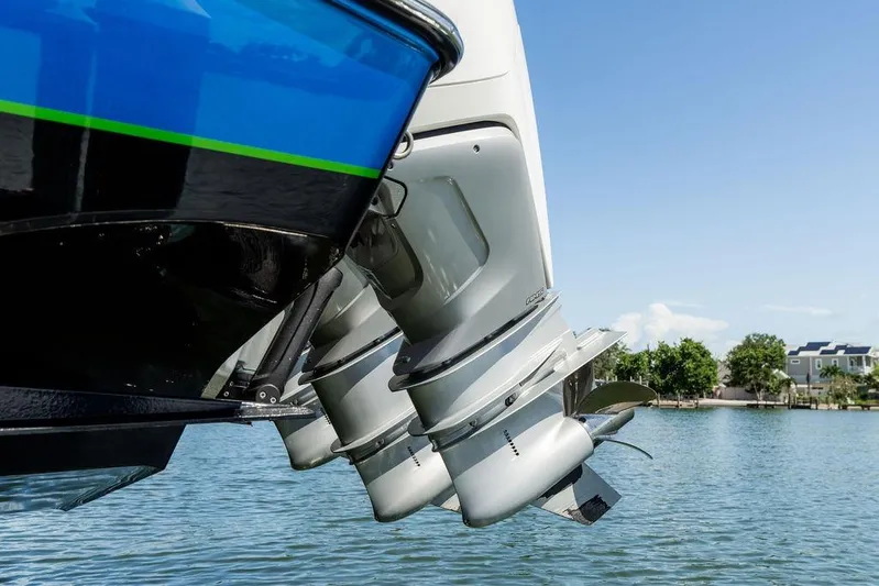  Yacht Photos Pics 2022 Fountain 34 SC boat engines on water, showcasing sleek design and powerful performance.