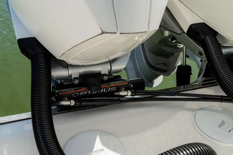  Yacht Photos Pics 2022 Fountain 34 SC boat with Optimus steering system, close-up view of outboard motors.