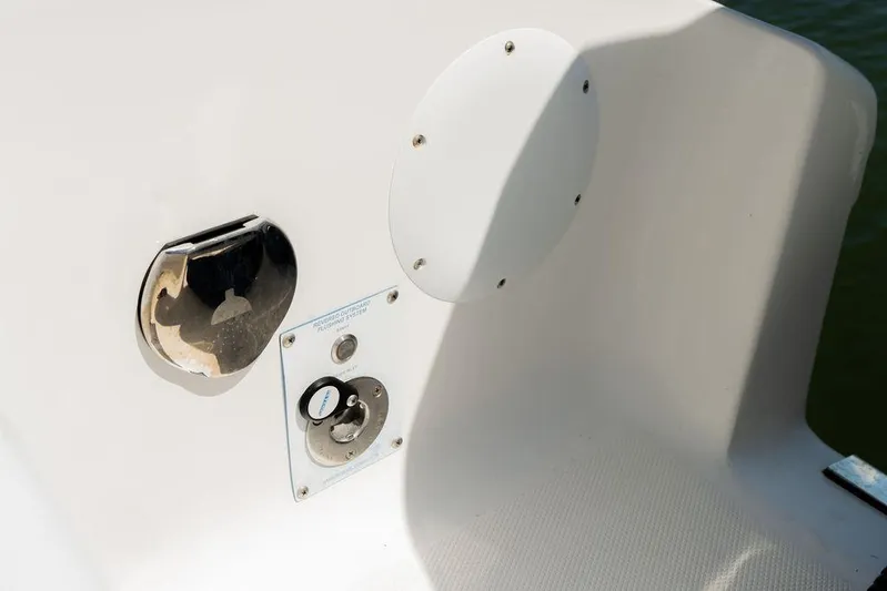  Yacht Photos Pics Close-up of 2022 Fountain 34 SC boat's fuel and water inlets.