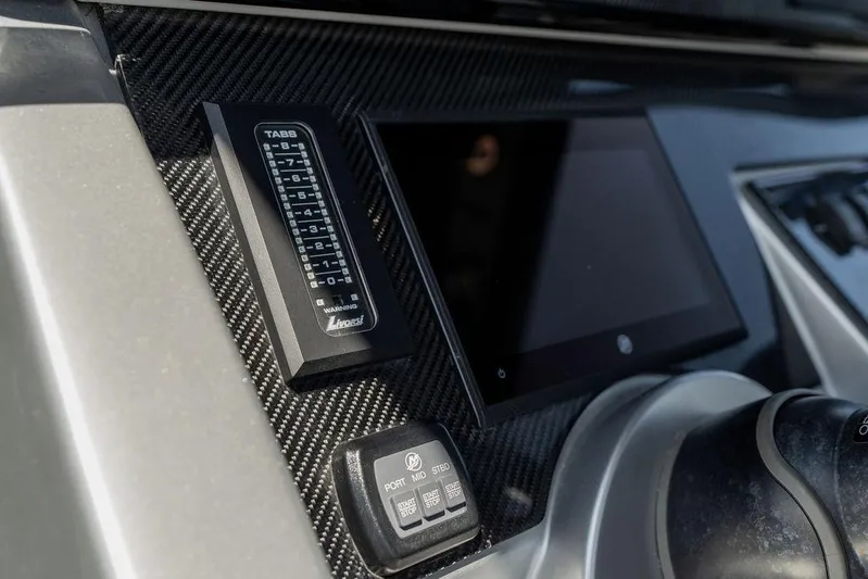  Yacht Photos Pics Control panel of 2022 Fountain 34 SC boat with digital display and switches.