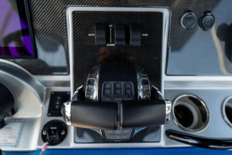  Yacht Photos Pics Control panel of 2022 Fountain 34 SC boat with throttle and switches.