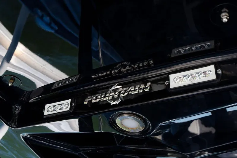  Yacht Photos Pics 2022 Fountain 34 SC boat with sleek black finish and LED lights.