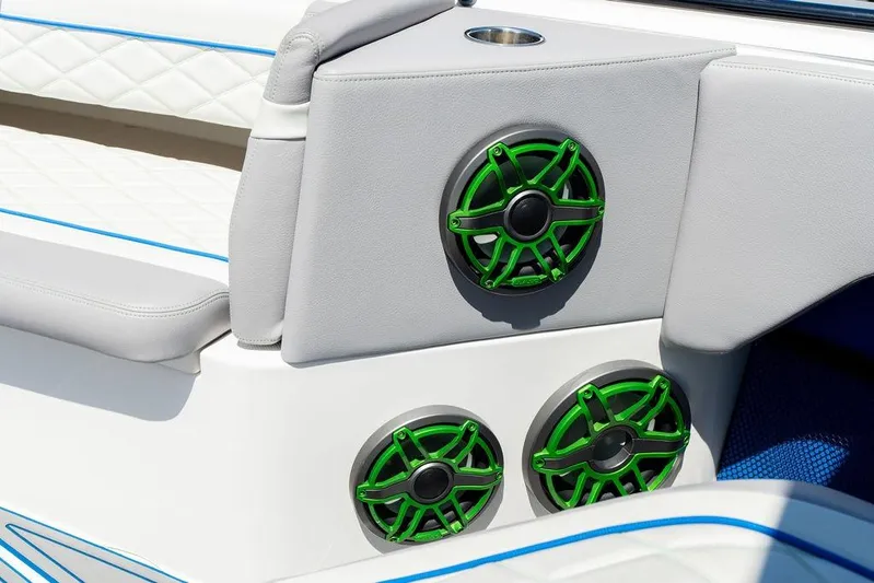  Yacht Photos Pics 2022 Fountain 34 SC boat interior with green speakers and white seating.