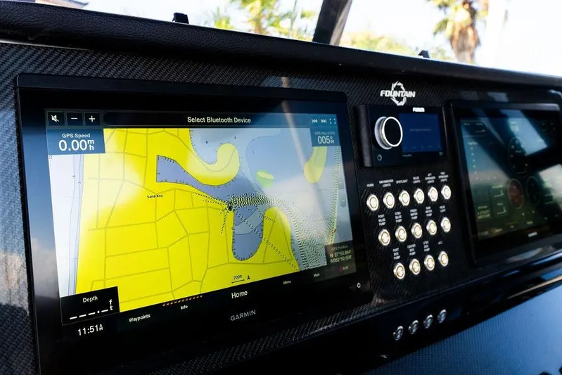  Yacht Photos Pics Dashboard of 2022 Fountain 34 SC boat with navigation and control screens.