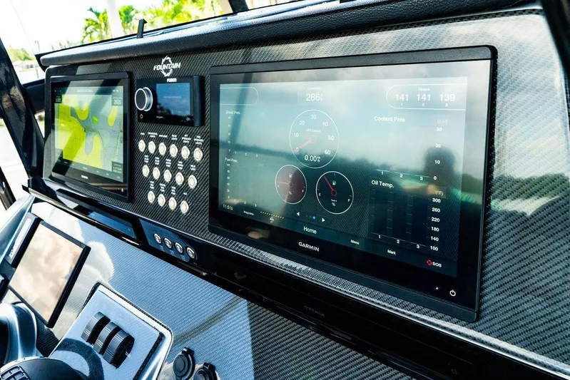  Yacht Photos Pics Dashboard of 2022 Fountain 34 SC boat with advanced Garmin navigation displays.