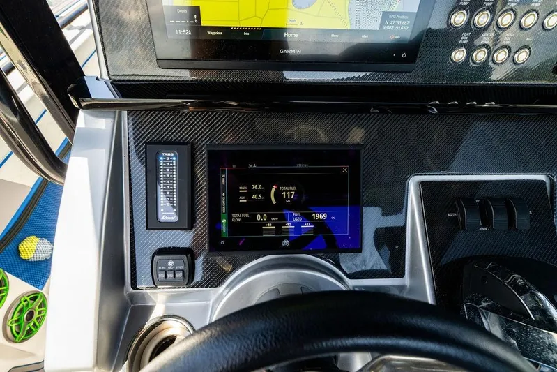  Yacht Photos Pics Dashboard of 2022 Fountain 34 SC boat with navigation and fuel displays.