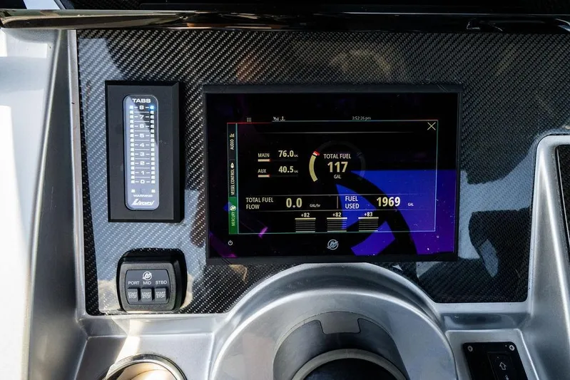  Yacht Photos Pics Dashboard of 2022 Fountain 34 SC boat with digital fuel display and controls.