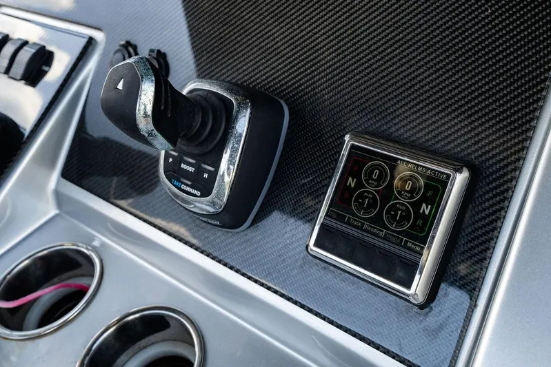  Yacht Photos Pics Control panel of 2022 Fountain 34 SC boat with joystick and digital display.