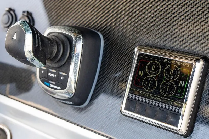  Yacht Photos Pics Control panel of 2022 Fountain 34 SC boat with joystick and display.