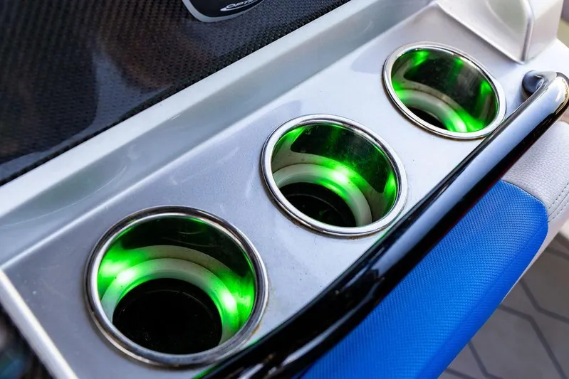  Yacht Photos Pics Illuminated cup holders on 2022 Fountain 34 SC boat, featuring green LED lights.