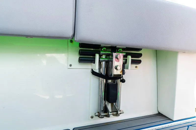  Yacht Photos Pics 2022 Fountain 34 SC boat ladder mechanism with cushioned seating.