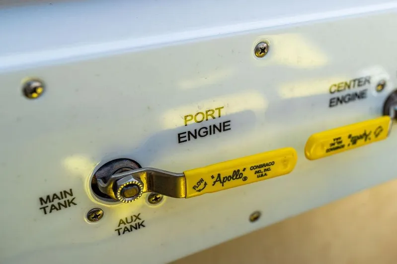  Yacht Photos Pics Control panel of a 2022 Fountain 34 SC boat, featuring engine and tank switches.