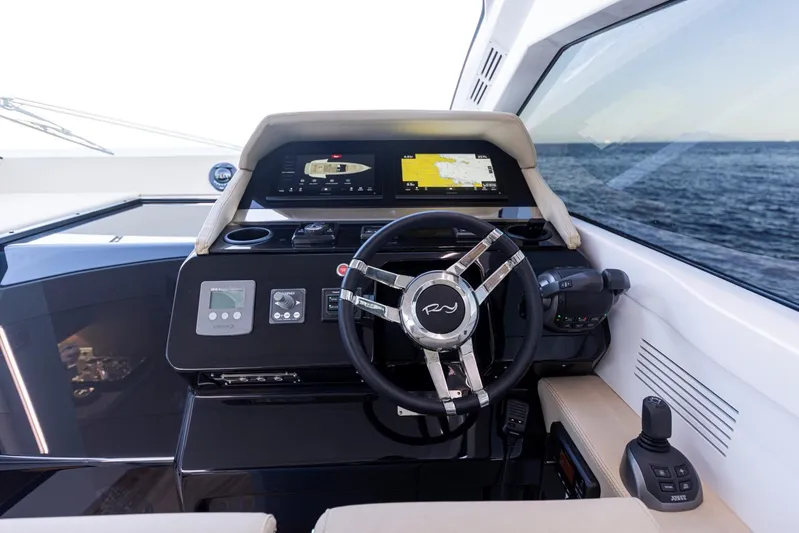  Yacht Photos Pics Helm of 2025 Rio Yachts Le Mans 45, featuring modern navigation and control systems.