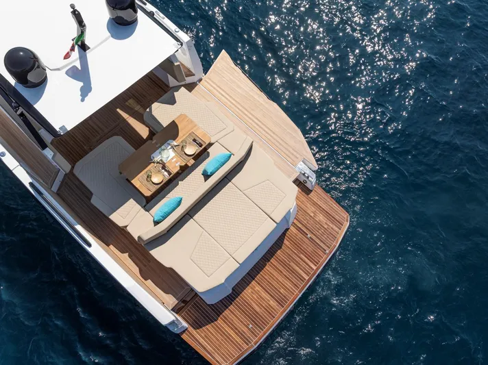  Yacht Photos Pics Aerial view of 2025 Rio Yachts Le Mans 45 luxury deck on blue ocean.