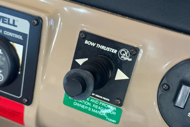 Once Around II Yacht Photos Pics Control panel of 1998 Carver 530 Voyager Pilothouse with bow thruster switch.