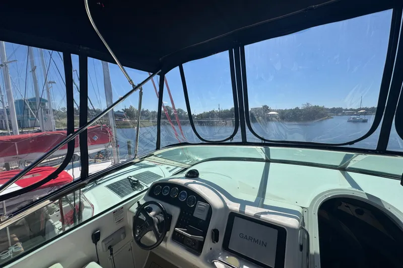 Once Around II Yacht Photos Pics Interior view of 1998 Carver 530 Voyager Pilothouse with Garmin navigation system.