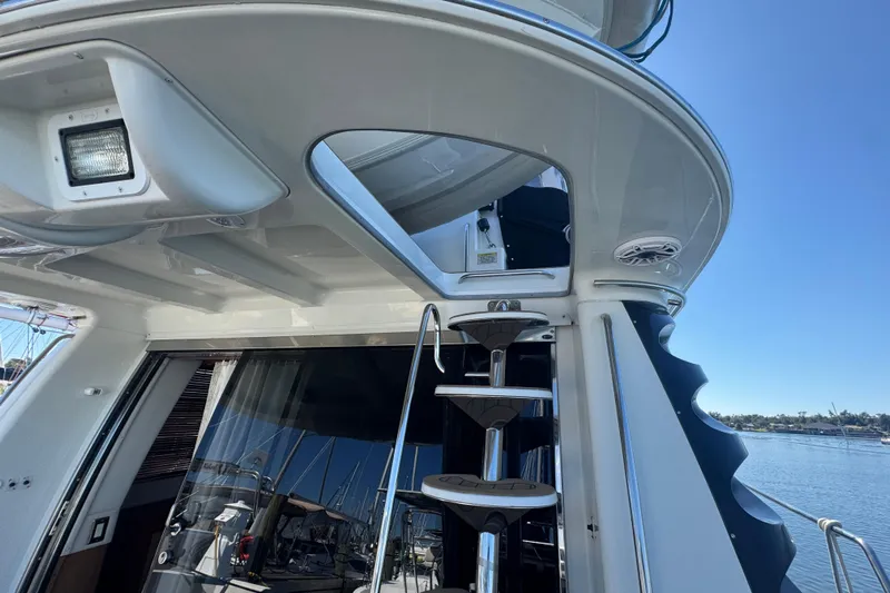 Once Around II Yacht Photos Pics Staircase on 1998 Carver 530 Voyager Pilothouse yacht, leading to upper deck.