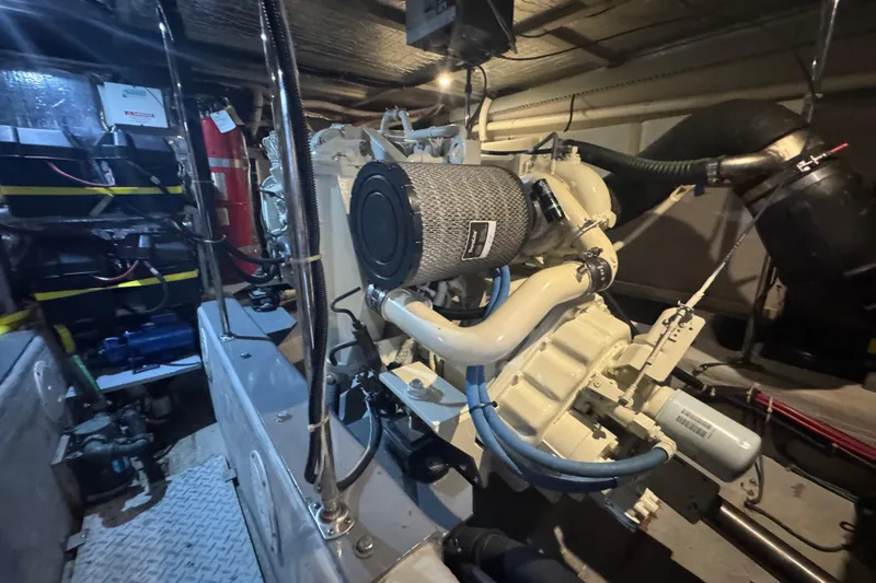 Once Around II Yacht Photos Pics Engine room of 1998 Carver 530 Voyager Pilothouse with visible machinery and components.