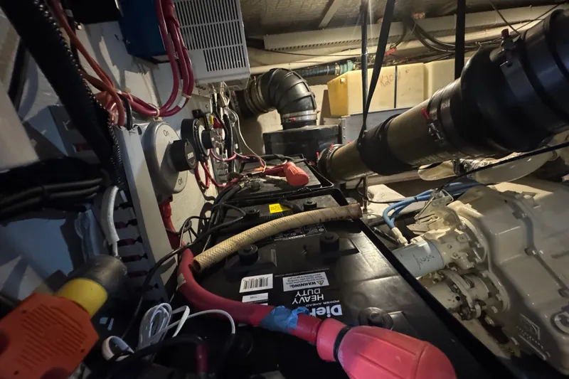 Once Around II Yacht Photos Pics Engine room of 1998 Carver 530 Voyager Pilothouse with wiring and components.