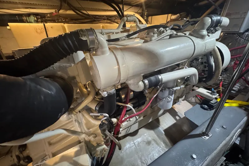 Once Around II Yacht Photos Pics Engine room of 1998 Carver 530 Voyager Pilothouse, showcasing detailed mechanical components.